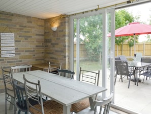 Dining room with patio door to garden | Golf Road, Mablethorpe, near Skegness