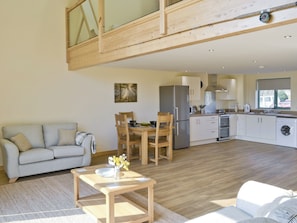 Convenient dining area and well equipped kitchen | Orchid Lodge - Springwater Lakes, Hainford, near Norwich