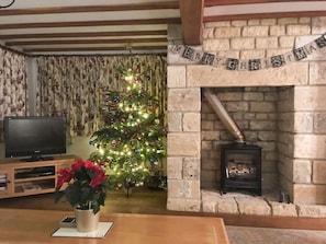 Living room decorated for Christmas | Orchard House, Chipping Campden