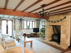 Elegant living room with feature fireplace | Orchard House, Chipping Campden
