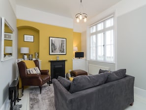 Cosy living room with open fire | Coastguard Retreat, Ramsgate