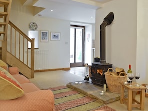Lounge with wood-burner and patio doors | Honey Cottage - Bramble Cottage and Honey Cottage, Newland, near Coleford