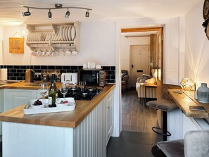 Well-equipped fitted kitchen and breakfast bar or work station | Time Cottage, Coltishall, near Wroxham