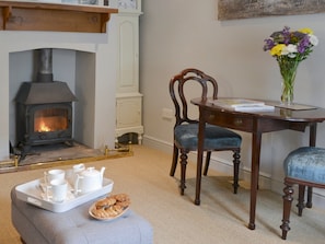 Warm and welcoming living and dining room | Time Cottage, Coltishall, near Wroxham