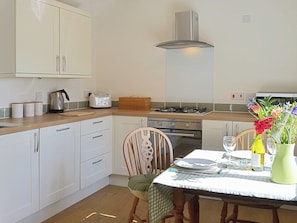 A bright and airy kitchen/diner makes a great place to take meals | Garden Cottage, Ugborough, near Ivybridge