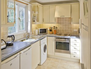 Well-equipped fitted kitchen | River Lodge, Polperro, near Looe