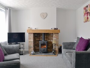 Cosy living room with wood burner  | Banovallum Cottage, Horncastle