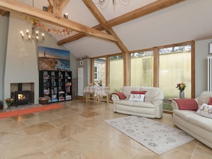 Open plan living/dining room with wood burner | Highbury Annexe, Frampton-on-Severn, near Stroud