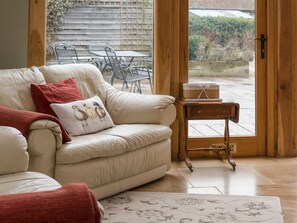 Open plan living/dining room with wood burner | Highbury Annexe, Frampton-on-Severn, near Stroud