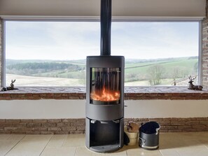Contemporary multi-fuel burner and amazing rural views | Combe View - Lower North Radworthy Cottages, Heasley Mill, near South Molton