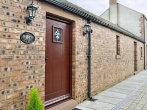 Main entrance to the holiday property | The Old Byre - West House Farm, Dearham, near Maryport