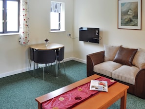 Living/dining room with compact dining area | Manacle View, St Keverne, near Helston