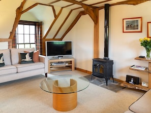 Living room with wood burner | Fochy Cottage - Waulkmill Cottages, Kinross, near Perth