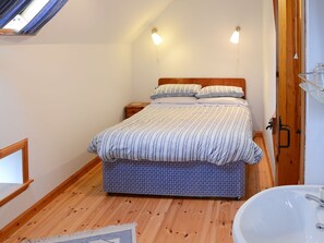 Inviting double bedroom with sloping ceiling | Watermill Cottages - Watermill Cottages, John O&rsquo; Groats