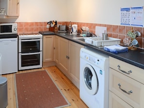 Delightful galley-style kitchen | Watermill Cottages - Watermill Cottages, John O’ Groats