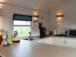 Kitchen area with breakfast bar | The Carriage, Bridge of Dee, near Castle Douglas