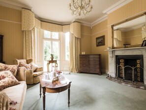 Living room with open fire | Northolme Hall, Wainfleet All Saints, near Skegness