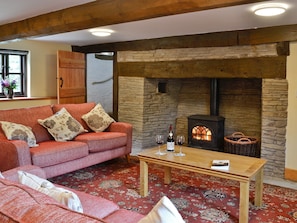 Living room with inglenook fireplace & wood burner | Mill Cottage, Peterchurch, near Hay-on-Wye