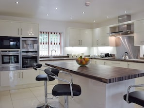 Well equipped kitchen with dining area | Hafan Dawel, Stepaside, near Saundersfoot