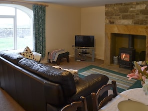 Cosy living room with wood burner | Grangemoor Barn, Scots Gap, near Morpeth