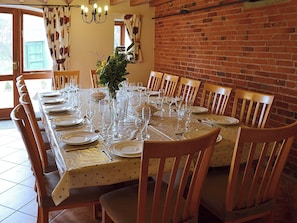 The huge kitchen dining table seats up to fourteen guests | The Granary, Somersal Herbert, Ashbourne