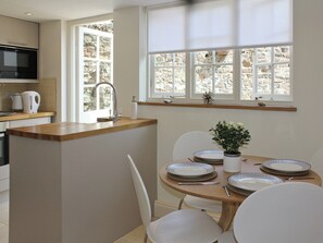 Open plan contemporary style kitchen and diner | Anchor Cottage, Deal