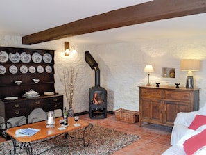 Living room with wood burner | The Stables, Woolaston, near Lydney