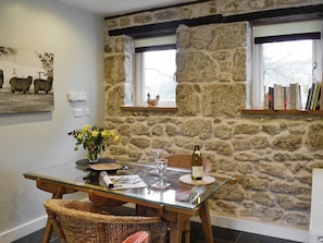 Dining area with exposed stone feature wall | Fisherman’s CottageThe Nook, Dartmeet, near Yelverton