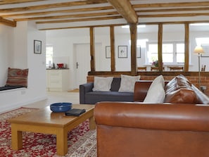 Comfortable living room full of character | The Hop Cottage - Castle Properties, Ashperton, near Ledbury