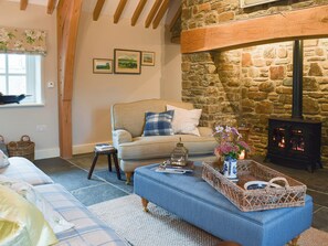 Cosy and inviting living room with gas wood burner | Soar Cottage, Dihewyd, near Aberaeron