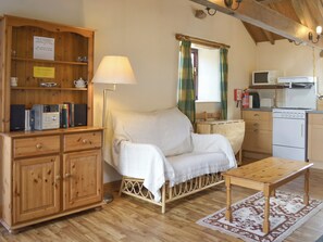 Comfy seating in lounge area | The Byre, Newby, near Appleby-in-Westmorland