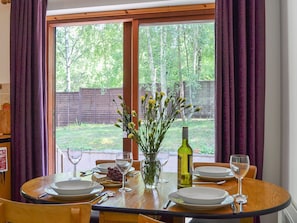 Dining area with French doors  | Squirrel Cottage, North Kessock