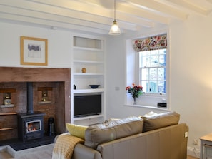 Cosy living area with multi-fuel burner | 1710 - The Seventeen Ten Cottages, Greenwell, near Brampton