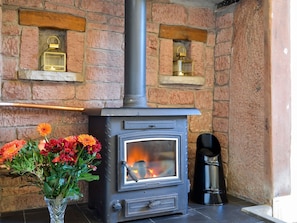 Cosy living area with multi-fuel burner | 1710 - The Seventeen Ten Cottages, Greenwell, near Brampton