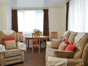 Homely living and dining room | Tynlone Villa, Swyddffynnon, near Devils Bridge