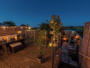 Decking at night | Harpers Cottage -  , Fence, near Burnley