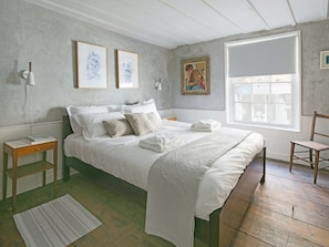 Double bedroom with wooden floor | Smugglers Cottage, Margate