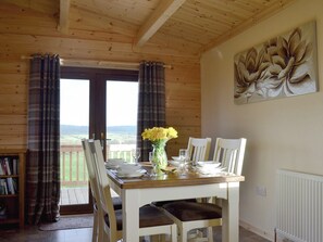 Lovely dining area with views to the surrounding countryside | Callow Lodge, Bromlow, near Minsterley