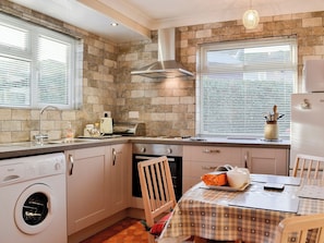 Beautifully tiled kitchen with dining area | Briar Bank Bungalow, Cockermouth