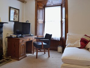 Guests have free use of the ganes console or can take time to relax and read in the study | The Old Post Office, Myddfai, near Llandovery