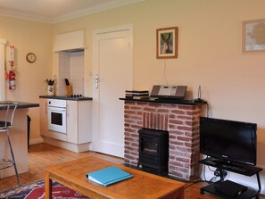 Delightful feature fireplace | Birch, Llanddona, near Beaumaris