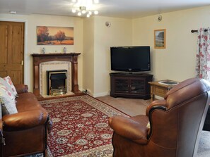 Cosy lounge area | The Bridge Inn Apartment, Bridgerule, near Bude