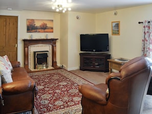Cosy lounge area | The Bridge Inn Apartment, Bridgerule, near Bude