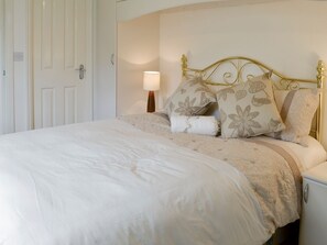 Comfortable double bedroom | Acacia - Thornbury Holiday Park, Woodacott, near Holsworthy