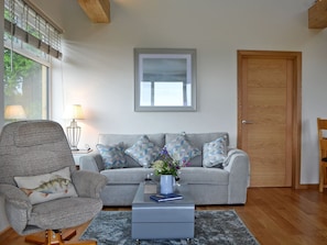 Tastefully furnished living area | Poachers View - Netherfield Hill Farm, Netherfield, near Battle