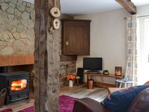 Cosy living room with wood beams & wood burner | Fourwinds, Farlow, near Ludlow