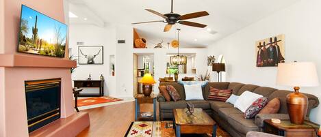 Living room with fireplace and nice furniture 