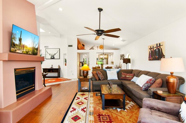 Living room with fireplace and nice furniture 