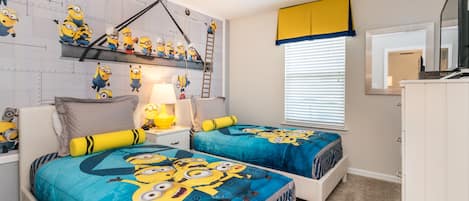 Minion themed kids room with 2 single beds