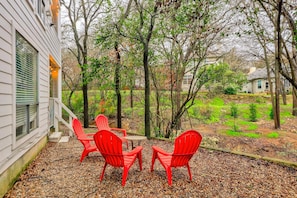 Relax outside with view of wet weather creek. 